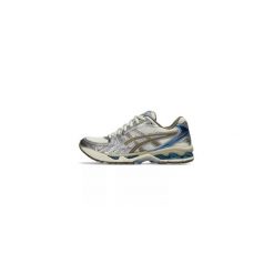 Buty biegowe ASICS Gel-Kayano 14 Damskie. Białe buty do biegania ASICS, bez wzorów, bez zapięcia, do biegania, asics gel kayano. Za 804.95 zł.