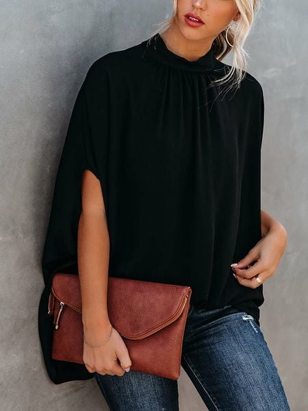 Milan Kiss Bluzka w kolorze czarnym rozmiar: M. Czarne bluzki Milan Kiss, m, bez wzorów, bez kołnierzyka, bez ramiączek. Za 104.89 zł.