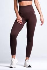 Legginsy bezszwowe damskie prążkowane Sunset. Czarne legginsy Make Us Strong, bez wzorów, z materiału, eleganckie. Za 149.99 zł.