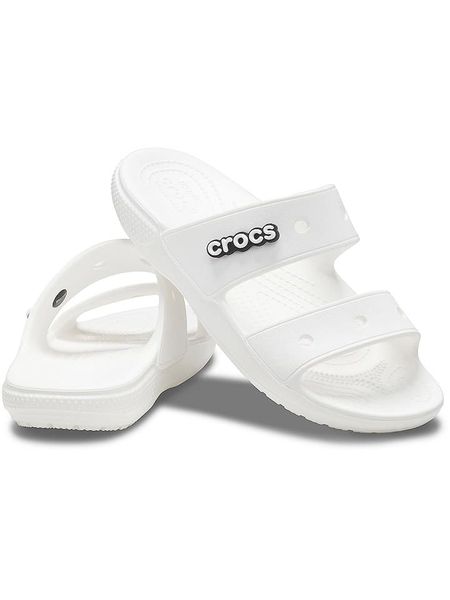 Crocs Klapki "Classic" w kolorze białym rozmiar: 43/44. Białe klapki Crocs, bez wzorów, klasyczne, z otwartym noskiem, bez obcasa, bez zapięcia. Za 119.95 zł.