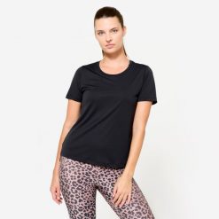 Koszulka fitness damska Domyos krótki rękaw. Czarne t-shirty sportowe DOMYOS, l, bez wzorów, z dzianiny, bez ramiączek, na fitness i siłownię. Za 39.99 zł.