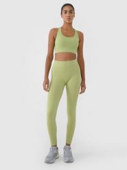 4F Legginsy treningowe bezszwowe damskie - zielone M/L. Zielone legginsy 4f, bez wzorów, z dzianiny, klasyczne. W wyprzedaży za 79.99 zł.