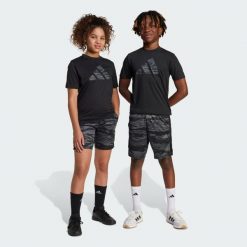 Szorty Train Essentials Camo Print Kids. Brązowe szorty adidas, bez wzorów, z materiału, młodzieżowe. W wyprzedaży za 111.20 zł.