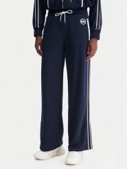 MICHAEL Michael Kors Spodnie dresowe MR630Y0K8N Granatowy Regular Fit. Niebieskie spodnie sportowe MICHAEL Michael Kors, bez wzorów, z dresówki. Za 769.99 zł.