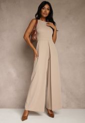 Beżowy Taliowany Kombinezon Ozdobiony Zakładkami Berinola. Brązowe sukienki Renee, na imprezę, l, bez wzorów, eleganckie, bez kołnierzyka, bez ramiączek, oversize. Za 149.99 zł.