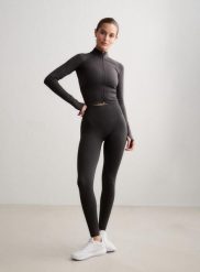 Damskie legginsy dłuższe, wysoki stan, invisible scrunch Shape Seamless szare. Szare legginsy AIM'N, bez wzorów, z dzianiny, długie. Za 300.00 zł.