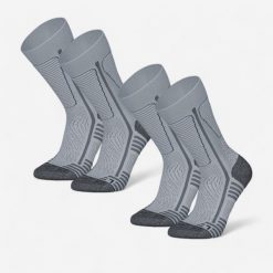 Skarpety turystyczne SH500 Mountain Mid. Niebieskie skarpetki QUECHUA, bez wzorów, z elastanu. Za 84.99 zł.
