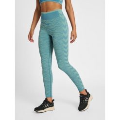 Legginsy damskie Hummel MT Saga. Niebieskie legginsy Hummel, bez wzorów, sportowe. Za 170.00 zł.