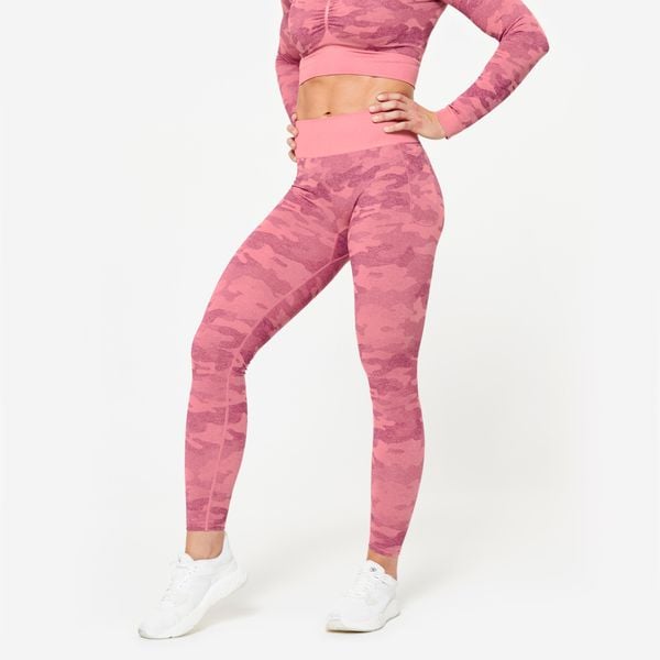 Legginsy fitness damskie Domyos. Czerwone legginsy DOMYOS, bez wzorów, z elastanu, sportowe. W wyprzedaży za 59.99 zł.