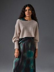 Rodier Wełniany sweter w kolorze beżowym rozmiar: L/XL. Brązowe swetry Rodier, l, bez wzorów, z wełny, klasyczne, bez ramiączek. Za 278.10 zł.