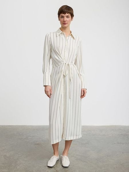 BGN Sukienka w kolorze kremowo-czarnym rozmiar: 36. Brązowe sukienki BGN, na imprezę, bez wzorów, bez kołnierzyka, bez ramiączek, maxi. Za 140.20 zł.