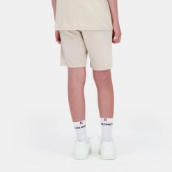 Szorty dla dzieci Le Coq Sportif N°1. Brązowe szorty Le Coq Sportif, bez wzorów, sportowe. Za 175.50 zł.