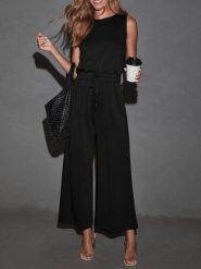 Milan Kiss Kombinezon w kolorze czarnym rozmiar: XL. Czarne kombinezony Milan Kiss, xl, bez wzorów, bez kołnierzyka, bez ramiączek. Za 173.99 zł.