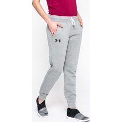 Under Armour - Spodnie. Szare spodnie dresowe Under Armour, bez wzorów, z bawełny. W wyprzedaży za 169.90 zł.