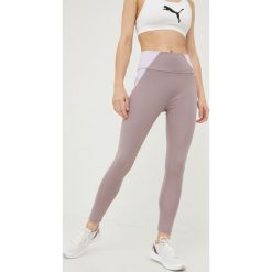 Puma legginsy treningowe Evostripe damskie kolor fioletowy wzorzyste. Fioletowe legginsy Puma, bez wzorów, ze skóry. Za 179.99 zł.
