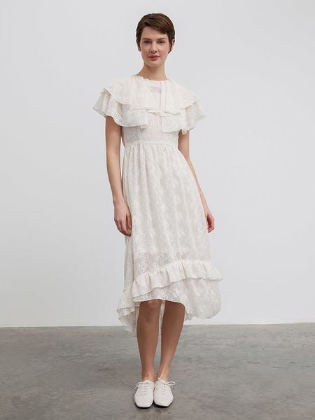 BGN Sukienka w kolorze kremowym rozmiar: 34. Brązowe sukienki BGN, na imprezę, bez wzorów, bez kołnierzyka, bez ramiączek, midi. Za 109.52 zł.