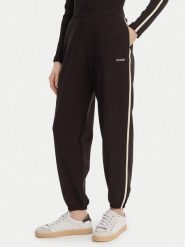 Guess Spodnie dresowe V6GB02 K2915 Brązowy Regular Fit. Brązowe spodnie dresowe Guess, z aplikacjami, z dresówki. Za 394.99 zł.