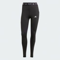Legginsy Techfit Stash Pocket Full-Length. Czarne legginsy adidas, bez wzorów, z dzianiny, długie. Za 213.90 zł.
