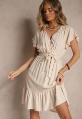 Beżowa Kopertowa Sukienka z Wiskozy Ozdobiona Paskiem Lanestea. Brązowe sukienki Renee, na co dzień, l, z aplikacjami, z wiskozy, eleganckie, bez kołnierzyka, bez ramiączek, midi, kopertowe. W wyprzedaży za 47.99 zł.