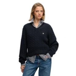 Damski oversize sweter z dekoltem w kształcie V Superdry. Niebieskie swetry Superdry, na zimę, bez wzorów, eleganckie, bez ramiączek. Za 288.40 zł.