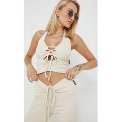 Sixth June top damski kolor beżowy. Brązowe topy Sixth June, m, bez wzorów, z dzianiny, bez kołnierzyka, bez ramiączek. W wyprzedaży za 71.99 zł.