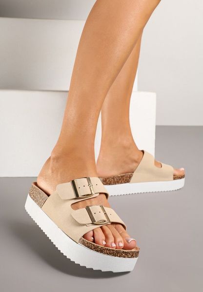 Beżowe Klapki z Dwoma Paskami i Klamrami Caldisa. Brązowe klapki Born2be, bez wzorów, klasyczne, bez obcasa, na płaskiej podeszwie, bez zapięcia. Za 69.99 zł.