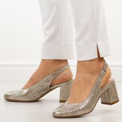 Złote ażurowe czółenka damskie na słupku Potocki 12582. Żółte czółenka POTOCKI, na lato, w ażurowe wzory, ze skóry, biznesowe, z okrągłym noskiem, bez obcasa, na słupku, bez zapięcia. Za 179.00 zł.