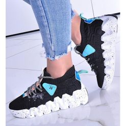 Pantofelek24 Czarne buty sportowe z białą podeszwą /F10-3 8304 S592/ 39. Białe buty sportowe lifestyle Pantofelek24, bez wzorów, bez zapięcia. Za 99.90 zł.