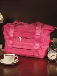 Składana torba podróżna z kieszeniami - różowy. Czerwone torby podróżne Sinsay, bez wzorów. Za 32.99 zł.