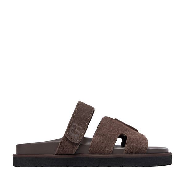 Klapki GINO ROSSI. Brązowe klapki Gino Rossi, bez wzorów, bez obcasa, bez zapięcia. Za 179.99 zł.