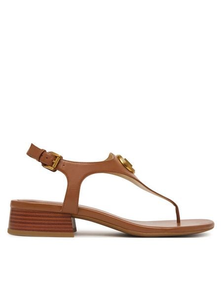 MICHAEL Michael Kors Sandały Mckenzie 40T6MZFS1L Brązowy. Brązowe sandały MICHAEL Michael Kors, bez wzorów, ze skóry, bez obcasa, na płaskiej podeszwie, bez zapięcia. Za 633.99 zł.