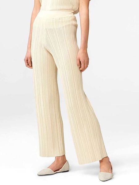 Orsay Spodnie w kolorze beżowym rozmiar: S. Brązowe spodnie materiałowe Orsay, bez wzorów, z materiału, z podwyższonym stanem. Za 69.91 zł.