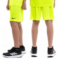 Dziecięce spodenki piłkarskie Nike Dry Park III limonkowo-pomarańczowe. Brązowe szorty Nike, bez wzorów, sportowe. Za 63.99 zł.