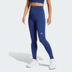 Legginsy Own the Run Full-Length. Niebieskie bielizna termoaktywna damska adidas, bez wzorów, z materiału, bez ramiączek, do biegania. W wyprzedaży za 227.90 zł.