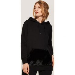 Bluza z ozdobną kieszenią - Czarny. Bluzy marki DOMYOS. W wyprzedaży za 39.99 zł.