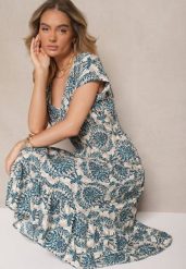 Niebieska Rozkloszowana Sukienka z Bawełny z Gumką w Talii Desanita. Niebieskie sukienki Renee, na co dzień, l, bez wzorów, z bawełny, eleganckie, bez kołnierzyka, bez ramiączek, midi, kopertowe. W wyprzedaży za 43.99 zł.