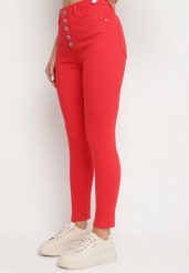 Czerwone Spodnie Skinny Kyllienne. Czerwone jeansy Born2be, na wiosnę, l, bez wzorów, z jeansu, z podwyższonym stanem, długie. W wyprzedaży za 59.49 zł.