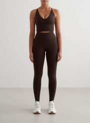 Damskie legginsy bezszwowe, wysoki stan, squat proof petite Shape czekoladowy. Brązowe legginsy AIM'N, bez wzorów, z elastanu, street. Za 296.00 zł.
