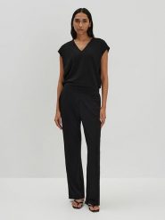 Someday Kombinezon w kolorze czarnym rozmiar: 38. Czarne kombinezony someday., bez wzorów, bez kołnierzyka, bez ramiączek. Za 282.80 zł.