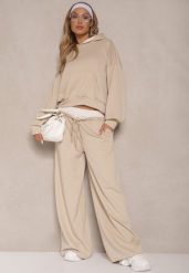 Beżowy Komplet Dresowy z Wiskozą Bluza i Spodnie o Szerokim Kroju Lisanora. Brązowe bluzy Renee, bez wzorów, z dresówki, eleganckie, bez ramiączek, z kapturem. W wyprzedaży za 159.99 zł.