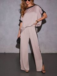 Milan Kiss Spodnie w kolorze beżowym rozmiar: S. Brązowe spodnie materiałowe Milan Kiss, bez wzorów, z materiału, z podwyższonym stanem. Za 130.99 zł.