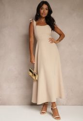 Beżowa Sukienka z Wiskozą o Rozkloszowanym Kroju z Wiązaniem Nilafeia. Brązowe sukienki Renee, na co dzień, l, bez wzorów, z wiskozy, eleganckie, bez kołnierzyka, bez ramiączek, maxi, kopertowe. W wyprzedaży za 83.99 zł.