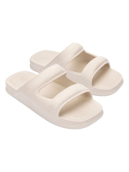 Melissa Klapki w kolorze kremowym rozmiar: 43. Brązowe klapki Melissa, bez wzorów, klasyczne, z otwartym noskiem, bez obcasa, bez zapięcia. Za 105.38 zł.