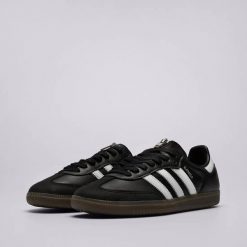 BUTY SPORTOWE UNISEX SKÓRZANE Z ZAMKIEM CZARNE ADIDAS SAMBA OG 38. Czarne buty do biegania adidas, bez wzorów, bez zapięcia, do biegania. Za 672.50 zł.