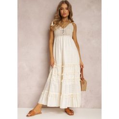 Jasnobeżowa Sukienka Eidameia. Brązowe sukienki Renee, m, bez wzorów, z koronki, boho, bez kołnierzyka, bez ramiączek, maxi, rozkloszowane. W wyprzedaży za 183.99 zł.
