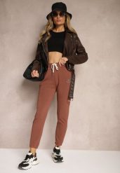 Brązowe Klasyczne Spodnie Dresowe z Elastyczną Gumką w Pasie Lerinde. Brązowe jeansy Renee, bez wzorów, z dresówki, klasyczne. W wyprzedaży za 29.99 zł.