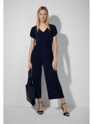 More & More Kombinezon w kolorze granatowym rozmiar: 38. Niebieskie kombinezony More & More, bez wzorów, z tkaniny, bez kołnierzyka, bez ramiączek. Za 165.99 zł.