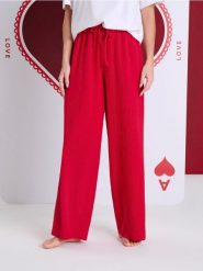 Spodnie od piżamy z muślinowej bawełny - czerwony. Czerwone piżamy Sinsay, l, bez wzorów, z bawełny, bez kołnierzyka, bez ramiączek. Za 29.99 zł.