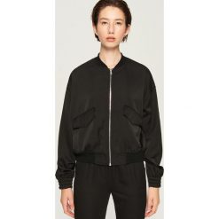 Kurtka bomber - Czarny. Kurtki marki QUECHUA. W wyprzedaży za 59.99 zł.