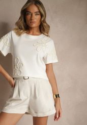 Biały T-shirt Zdobiony Aplikacjami w Kształcie Kwiatów Tilasea. Białe t-shirty Renee, l, z aplikacjami, z jeansu, eleganckie, bez kołnierzyka, bez ramiączek. W wyprzedaży za 67.99 zł.